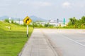 Warning turn right sign near the road