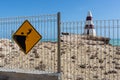 The warnings on the fenceline around the Obelisk landmark lcoated in the south east town of Robe South Australia taken on February