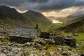 Warnscale Mountain Bothy With Dark Moody Clouds And Buttermere Lake In The Distance. Lake District, UK. Royalty Free Stock Photo