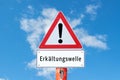 Warnsign ErkÃÂ¤ltungswelle German Royalty Free Stock Photo