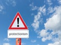Warnsign protectionism on blue background
