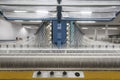 Warping machine in a textile weaving factory