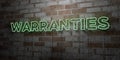 WARRANTIES - Glowing Neon Sign on stonework wall - 3D rendered royalty free stock illustration Royalty Free Stock Photo