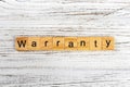 Warranty word made with wooden blocks concept Royalty Free Stock Photo