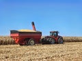 CASE IH 470 Steiger tractor pulling a fully loaded Brent Avalanche 1396 grain cart