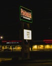 Warren, Ohio, USA - 4-15-22: A sign outside of a Ponderosa Steakhouse at night