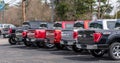 Warren, Pennsylvania, USA April 7, 2023 A line of different Ford F150 trucks for sale at a dealership