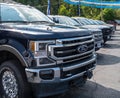 Warren, Pennsylvania, USA August 27, 2023 Ford pickup trucks lined up for sale at a dealership