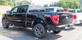 Warren, Pennsylvania, USA August 27, 2023 Ford pickup trucks lined up for sale at a dealership