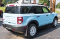 Warren, Pennsylvania, USA August 27, 2023 A new, light blue Ford Bronco SUV for sale at a dealership