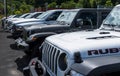 Warren, Pennsylvania, USA August 14, 2022 Several Jeep Wranglers and Dodge Ram trucks lined up at a dealership