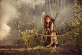 Fantasy medieval woman hunting in mystery forest Royalty Free Stock Photo