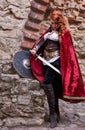 Warrior woman with sword in medieval clothes is very dangerous Royalty Free Stock Photo