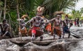 Warriors Asmat tribe are use traditional canoe. Royalty Free Stock Photo