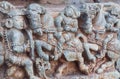 Warriors and horseriders on stone sculptures of decoration inside the Hindu temple. Royalty Free Stock Photo