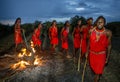 Warriors the Masai tribe dancing ritual dance around the fire late in the evening. Royalty Free Stock Photo