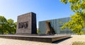 Warsaw Ghetto Heroes monument by Albert Speer in front of POLIN Museum of the History of Polish Jews in historic Jewish ghetto Royalty Free Stock Photo