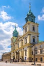 Warsaw, Poland - Front view of the baroque Holy Cross Church, at the Krakowskie Przedmiescie street in the Old Town quarter of Royalty Free Stock Photo