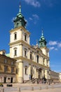 Warsaw, Poland - Front view of the baroque Holy Cross Church, at the Krakowskie Przedmiescie street in the Old Town quarter of Royalty Free Stock Photo