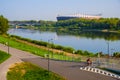 Warsaw, Mazovia, Poland - Panoramic view of the PGE Narodowy national stadium across the Vistula river seen from Solec district