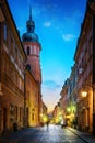 Warsaw old town street. Evening view of old houses and Church. L Royalty Free Stock Photo