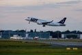 Warsaw, Poland - 12.06.2022: Aircraft LOT Airlines taking off at Chopin airport. Royalty Free Stock Photo