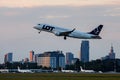 Warsaw, Poland - 12.06.2022: Aircraft LOT Airlines taking off at Chopin airport. Royalty Free Stock Photo