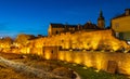 Evening panorama of defense city walls, moat and tenement houses in Starowka Old Town of Warsaw, Poland