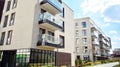 Modern apartment building in Srodmiescie district on a sunny day with a blue sky. Facade of a modern apartment.