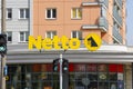 A yellow sign of a commercial network called Netto