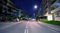 `Artystyczny Zoliborz`. Modern apartment buildings at night. This is a unique place. Functional, smartly designed. This is an aest