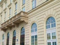 Detail of classicistic palace nowadays used by bank for their offices with beautiful big windows