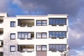 Facade of new apartment building. External view of modern complex of new apartment residential buildings. Street external view Royalty Free Stock Photo