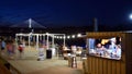 Vistulan Boulevards on the western side of the River Vistula in Warsaw in night. The promenade at the bank of the Vistula river i