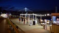 Vistulan Boulevards on the western side of the River Vistula in Warsaw in night. The promenade at the bank of the Vistula river i