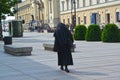 WARSAW, POLAND. The Catholic nun goes to a church of the Sacred Cross Royalty Free Stock Photo