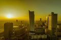 WARSAW, POLAND - DEC. 27, 2017: top view of a modern city with skyscrapers in the evening twilight. orange sunset over the city. t Royalty Free Stock Photo