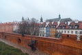 Warsaw, Poland Famous Barbican old town historic capital city during rainy winter day and red orange brick wall fortress Royalty Free Stock Photo