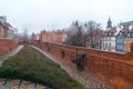 Warsaw, Poland Famous Barbican old town historic capital city during rainy winter day and red orange brick wall fortress Royalty Free Stock Photo