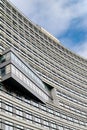 Warsaw Poland. February 18, 2019. Bottom view glass grey square Windows of modern city business building skyscraper. Receding