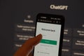 ChatGPT login screen seen on smartphone screen. OpenAI chat bot