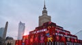 Big multimedia structure shaped as a pyramid made with screens leds. The charity campaign of the Great Orchestra of Christmas Char