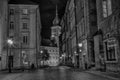 WARSAW, POLAND, July 1, 2016: Lonely boy on the night street of the Old City in Warsaw