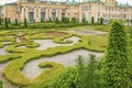 Warsaw, Poland - June 10, 2021: An ancient castle and a beautiful, well-tended garden all around