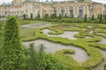 Warsaw, Poland - June 10, 2021: An ancient castle and a beautiful, well-tended garden all around