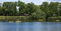 A relaxed family kayaking trip along a small river