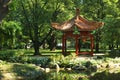 Warsaw, Poland - June 9, 2018: Chinese pavilion with sculptures in Lazienki Park, or Royal Baths, the largest park in Warsaw which