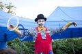 Clown during outdoor performance on Kids Day