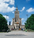 WARSAW, POLAND - JUNE 15, 2016: People walking in front of Palace of Culture and Science, skyscraper, symbol of communism and