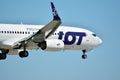 Plane LOT - Polish Airlines Boeing 737 just before landing at the Chopin airport. Royalty Free Stock Photo